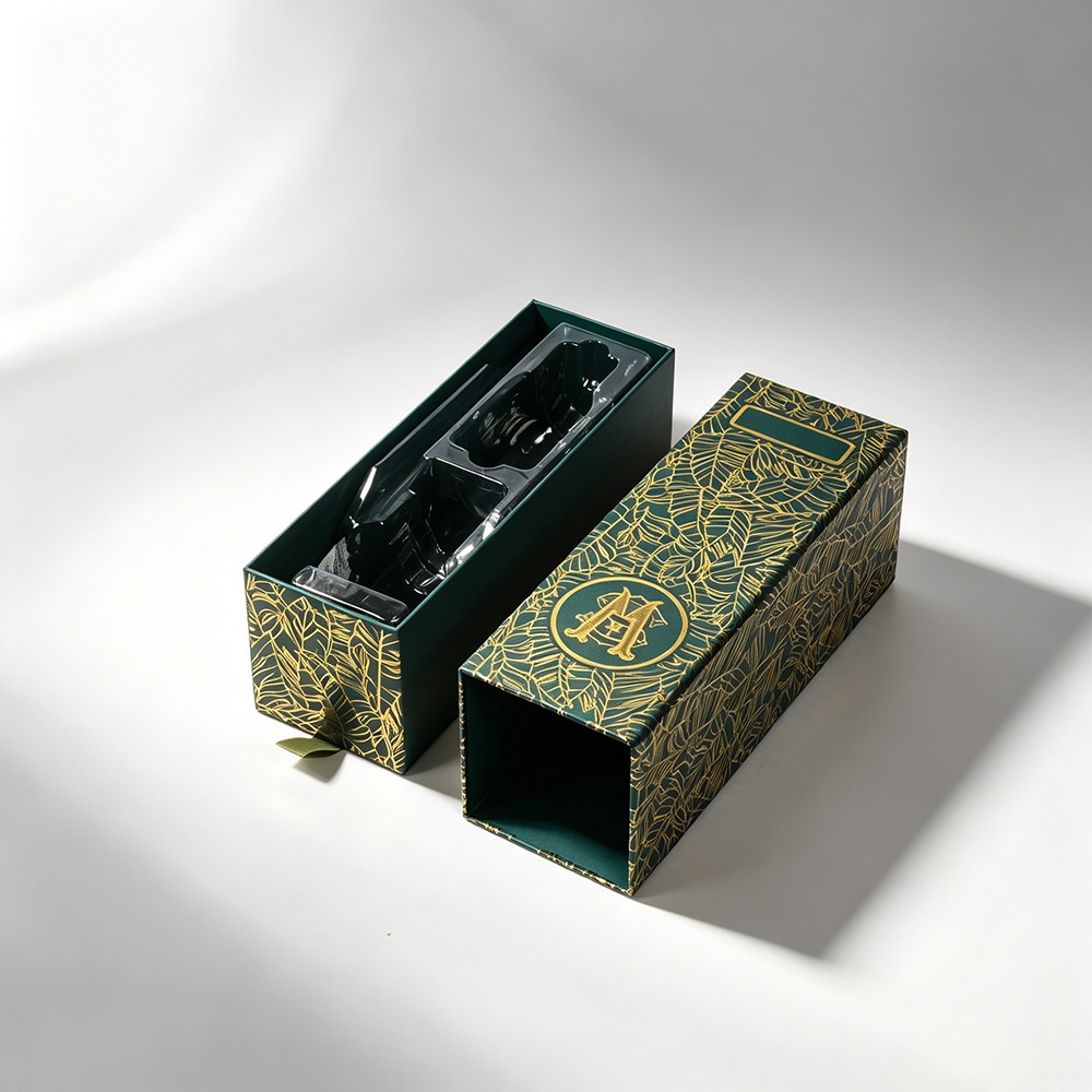 Green premium packaging box with gold pattern and protective insert